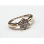 9ct yellow gold diamond cluster ring size M. 1.7g and 0.25ct.
