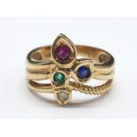 18ct Diamond, ruby, emerald and sapphire ring. Size L. Weighs 4g.