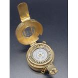 A Brass Compass stamped TG Co Ltd, London, 1940. 6 x 10cm