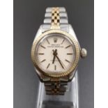 Ladies Rolex Oyster Perpetual Precision Model WATCH. Two tone metal strap. 26mm face.