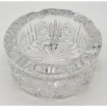 Heavy glass ashtray with etching to to surround and bottom. 15cm x 6cm.