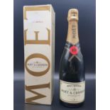 Bottle of Moet and Chandon CHAMPAGNE, Brut Imperial, in box.