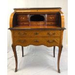 A beautifully inlaid Edwardian writing bureau with roll top and chevroned top. 104 cams tall 76