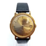Vintage Patek Philippe Geneve gold gent watch, round face 35mm and date box