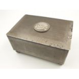 Silver Plated Box with a Waffen SS skull adhered on the lid.