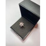 9ct Gold CLUSTER RING having sparkling clear stones to top set in Flower or Star formation. Full