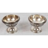 A Pair of Silver Dessert Dishes. Removable bowls - Open Flower Design. 7cm diameter. 7cm tall.