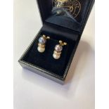 18ct Gold Diamond and Pearl EARRINGS. Having Diamonds se4t kin Gold to centre with Pearls either