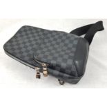 A Louis Vuitton Avenue Sling Bag in a stylish checked pattern. Gently used twice, no sign of wear or