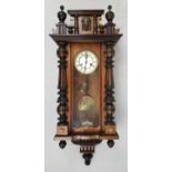 8 day Viennese regulator wall clock. Circa 1860 with pendulum and key.
