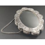 Antique silver mirror with floral engraves, weight 167g and size 11.5x8.5cm