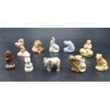 A Selection of 10 ceramic miniature Wade animal figurines.
