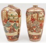 A PAIR OF HAND PAINTED VASES WITH CHINESE CHARACTERS ON THE BASE . HEIGHT 15cms