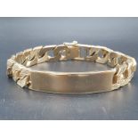 A 9 carat, fully hallmarked, gents ID bracelet, with bark effect chain. Length: 23cm, weight: 54g.