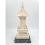 A 19th Century Japanese Ivory Shrine (Meiji Period). The Pagoda top carved in low relief with