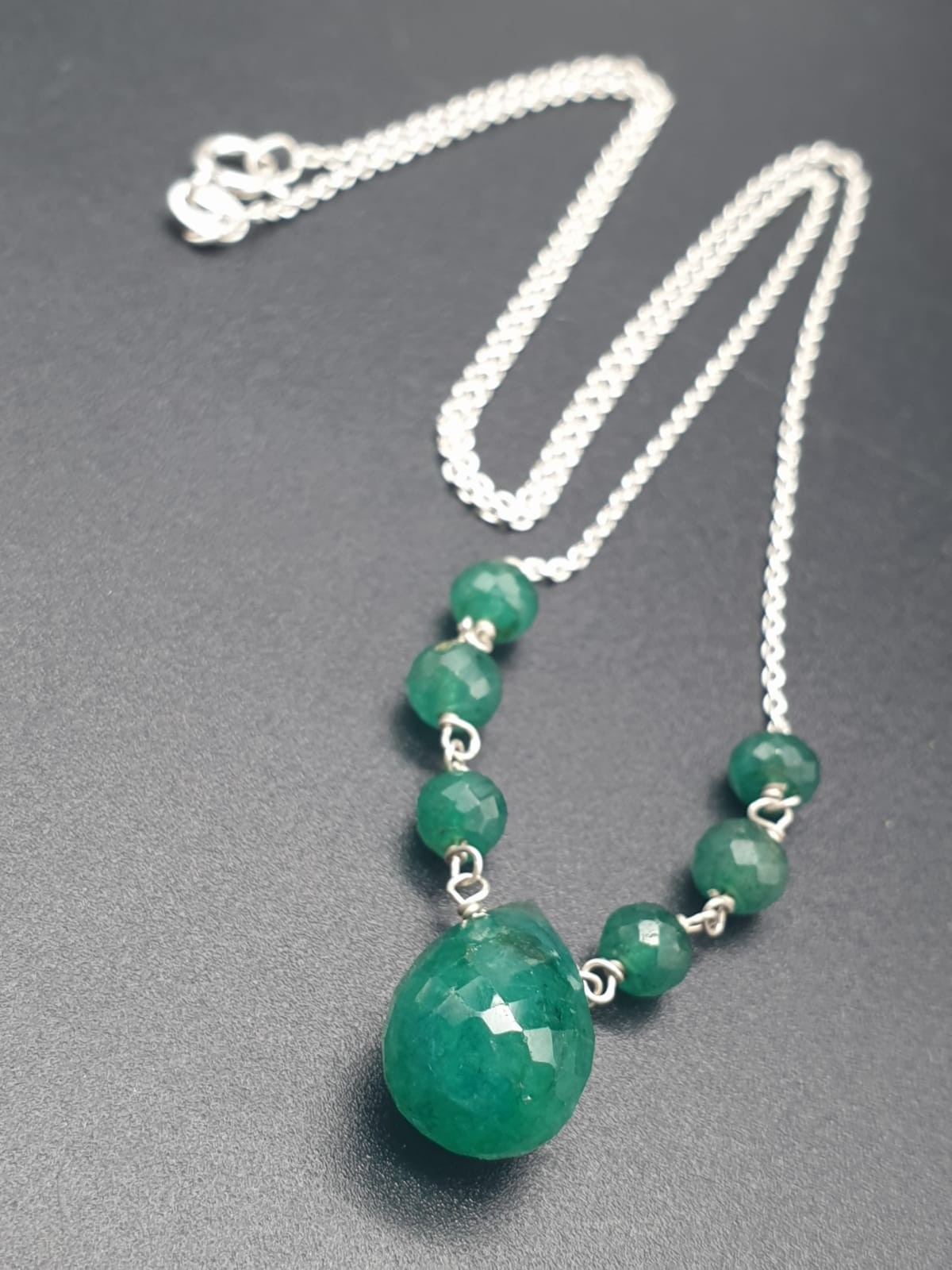 A collection of emerald drops necklace with matching earrings and emerald ring size O - Image 7 of 9