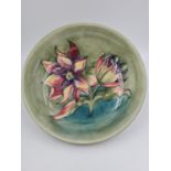A Beautiful Vintage Moorcroft Fruit bowl. Decorative Floral Design on a lustrous Green Glaze. 24cm