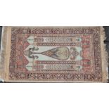 EARLY PERSIAN HAND KNOTTED RUG OR PRAYER MAT DECORATED WITH FLOWERS AND COLUMNS 153CMS X 90CMS