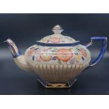 A VINTAGE FLORAL DECORATED HEXAGONAL TEA POT BY S. JOHNSON LTD OF BURSLEM, 16cms TALL and 28cms from