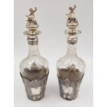 A beautiful pair of antique silver etching bottles. Dated London 1896 and imported by Berthold