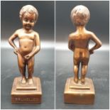 A metal souvenir statue of the famous Peeing Boy of Brussels. 21cm