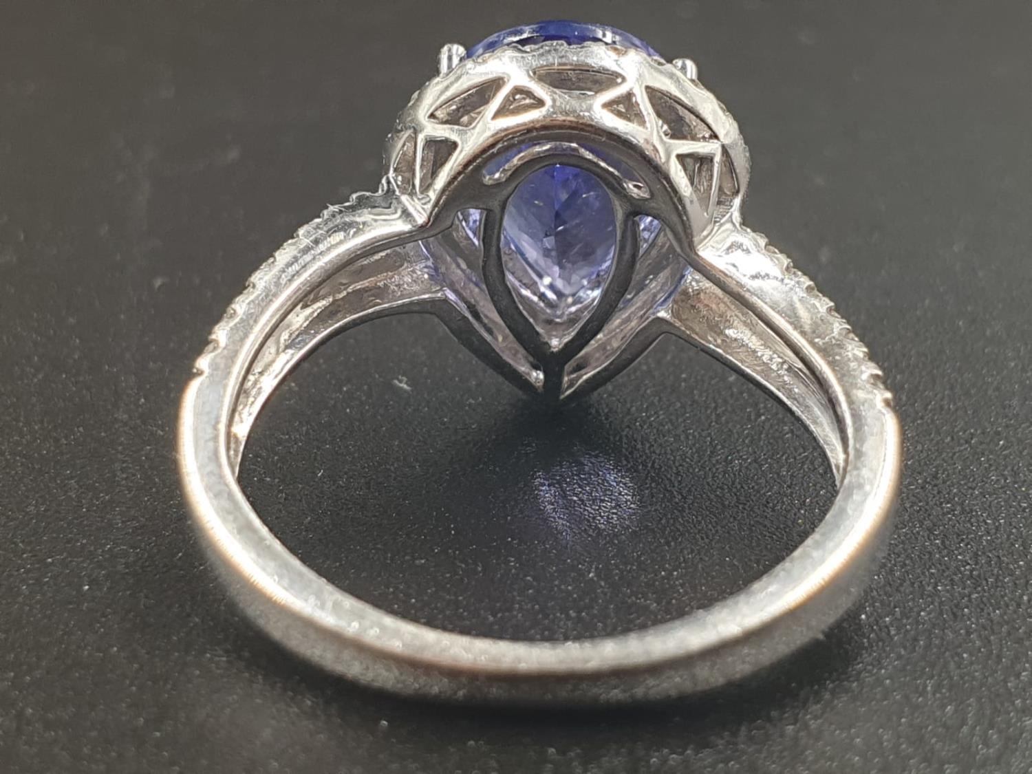 A 14CT WHITE GOLD MATCHING SET OF EARRINGS AND DRESS RING WITH LARGE PEAR SHAPED TANZANITE STONES - Image 5 of 14