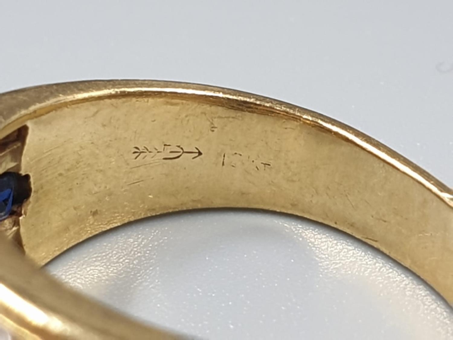 AN 18CT GOLD RING WITH CHANNEL SET DIAMONDS AND SAPHIRES 7.4gms SIZE N - Image 6 of 7