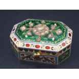an exquisitely decorated 22ct gold and enamel pill box adorned with diamonds, 4 x 2.8cms and