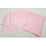 A Louis Vuitton style Shawl. Pink with logo embroidery. Good Condition.