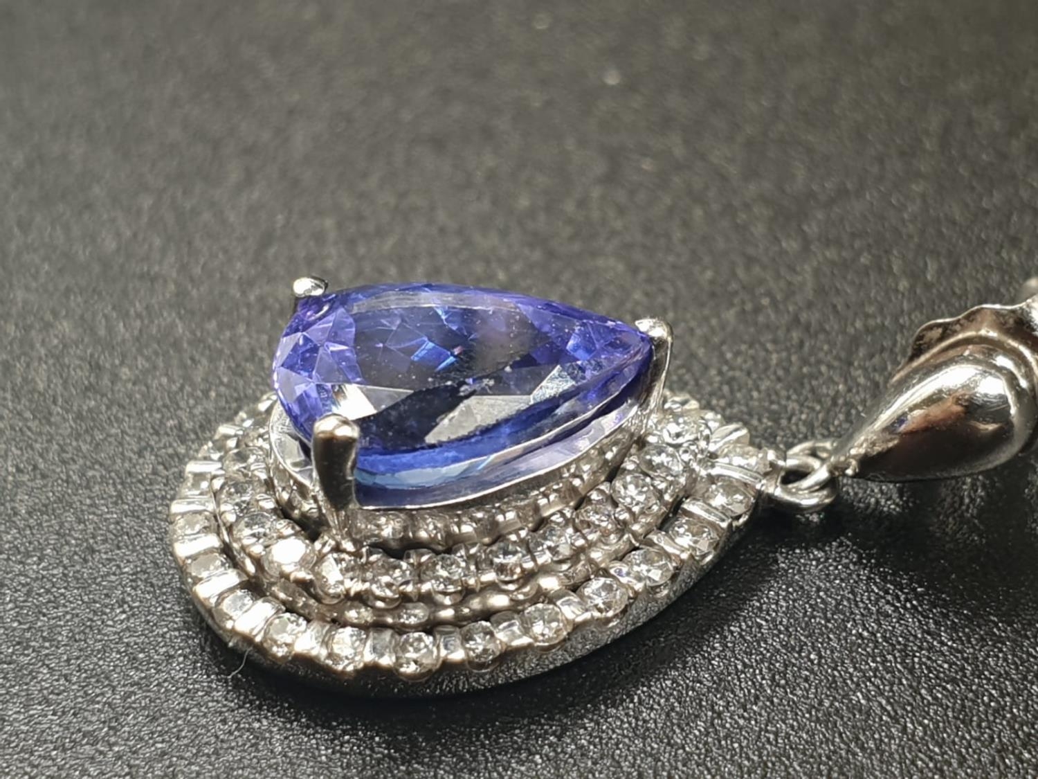 A 14CT WHITE GOLD MATCHING SET OF EARRINGS AND DRESS RING WITH LARGE PEAR SHAPED TANZANITE STONES - Image 10 of 14