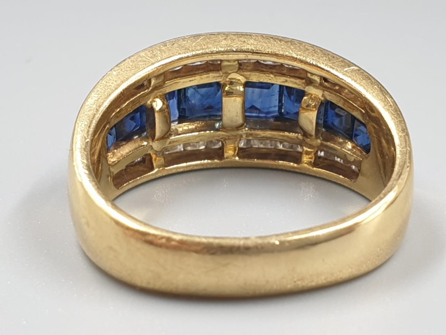 AN 18CT GOLD RING WITH CHANNEL SET DIAMONDS AND SAPHIRES 7.4gms SIZE N - Image 4 of 7