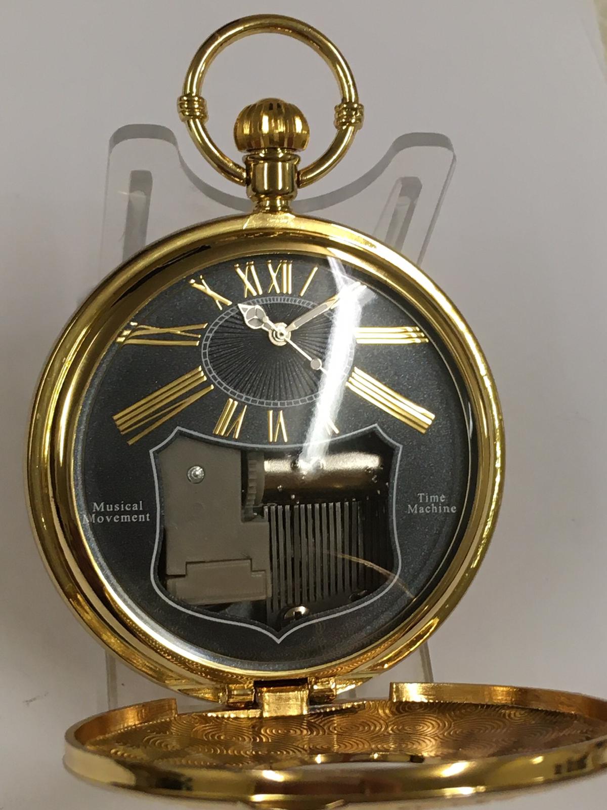 Musical full hunter pocket watch , working and mechanical music playing is functional