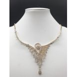 A very elegant gold (18 carat) and diamond necklace. Total weight of diamonds: 4 carats. Length of