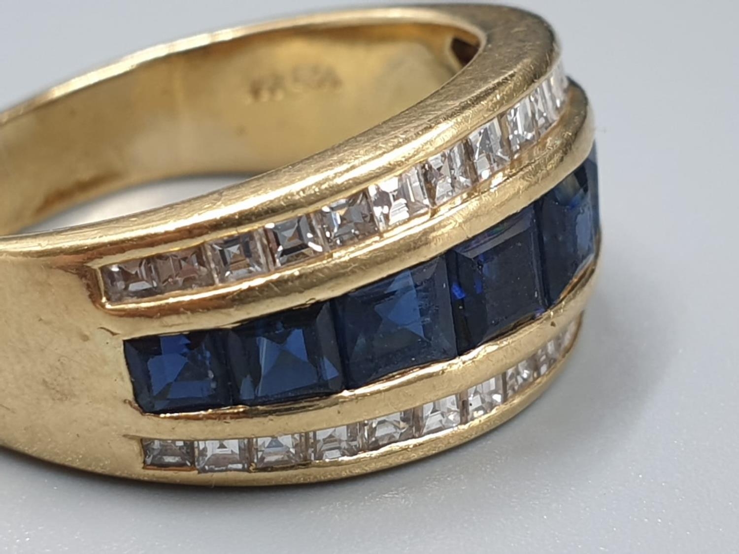 AN 18CT GOLD RING WITH CHANNEL SET DIAMONDS AND SAPHIRES 7.4gms SIZE N - Image 2 of 7