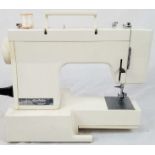 A 1960'S ELECTRIC SEWING MACHINE MADE BY FRISTER AND ROSSMAN, FULL WORKING ORDER