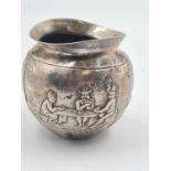 19TH CENTURY GERMAN SILVER BOWL PORTRAYING VILLAGE LIFE. 75.7gms AND 7.5cms IN HEIGHT