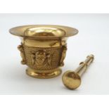 A very ornate, Asian, brass, mortar and pestle. Weight: 868g.