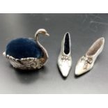 Victorian silver set of a swan and a pair of shoes cushion pins , total weight 93.7g