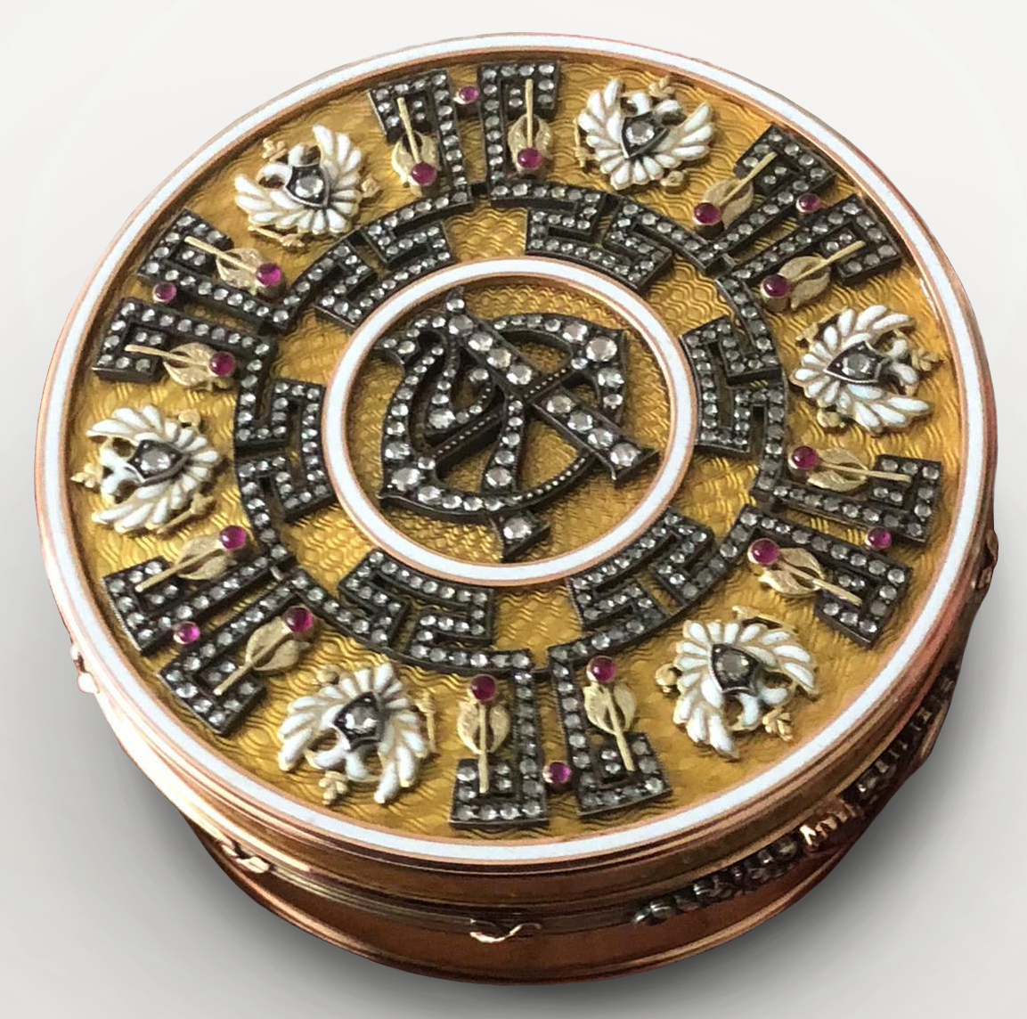 A stunning piece of art made from solid 14CT Gold and inlaid with Genuine Diamonds and Rubies