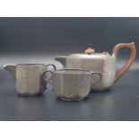 AN EARLY LIBERTY 3 PIECE TEA SET. Tea Pot: 10cm height Sugar bowl: 5.6cm height Creamer: 6.4cm