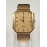 A PATEK PHILIPPE 18K GOLD GENTLEMANS WRIST WATCH WITH SOLID GOLD STRAP AND QUARTZ MOVEMENT. 300MM