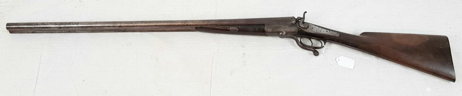 A DEACTIVATED DOUBLE BARRELLED SHOTGUN CIRCA 1860 FROM GRAHAMS OF INVERNESS . ONE HAMMER IN NEED