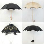 A Selection of 4 Antique/Vintage Umbrellas. All in working order, including a Victorian mourning