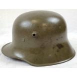 WW1 German M16 Stahlhelm Helmet with liner and original paint. Unusual field repair to one of the