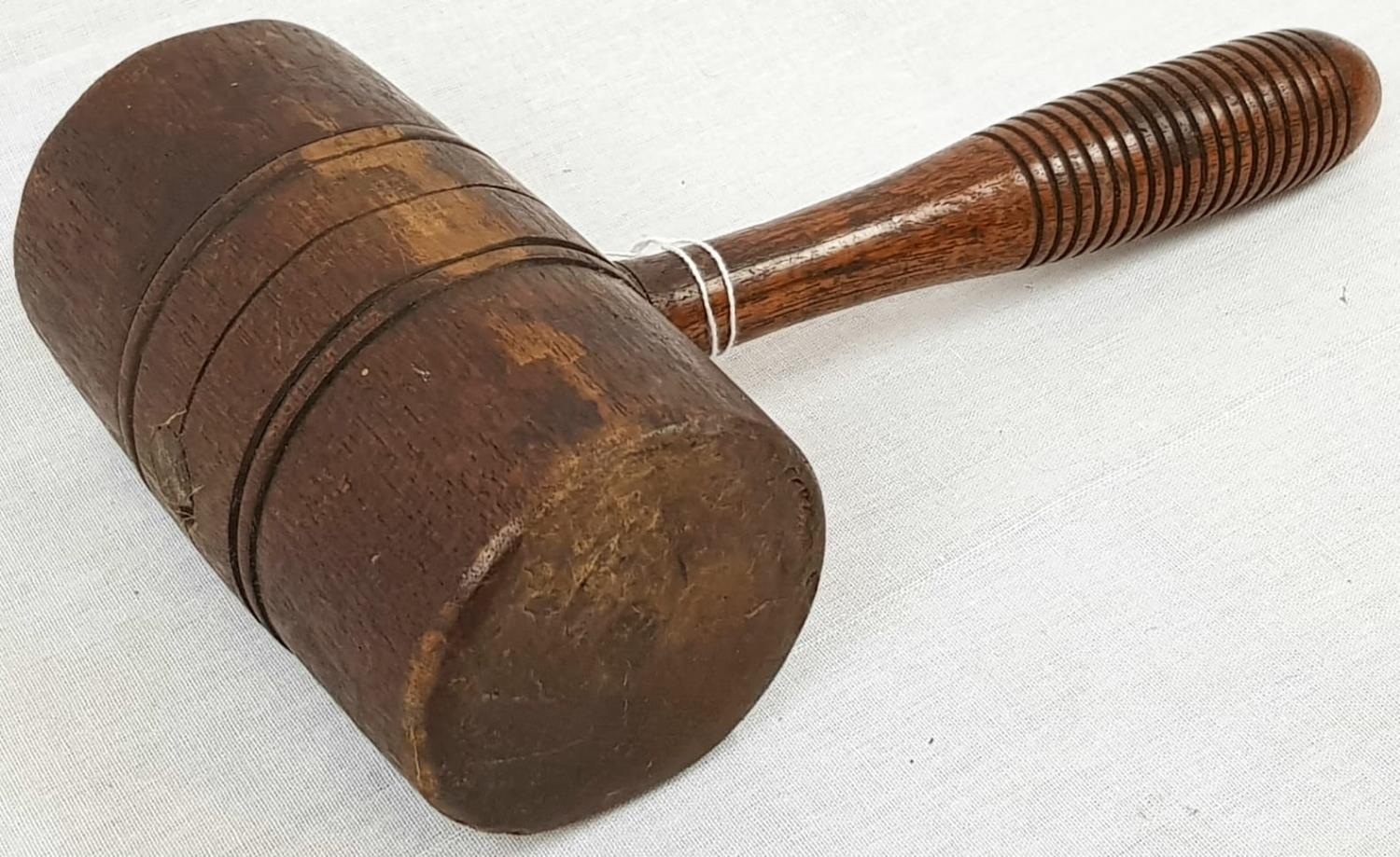 A VINTAGE AUCTIONEERS WOODEN HAMMER. 24 X 13cms