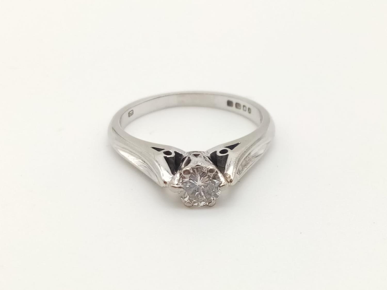 18k white gold 0.60ct diamond solitaire ring, weight 3.2g and size L