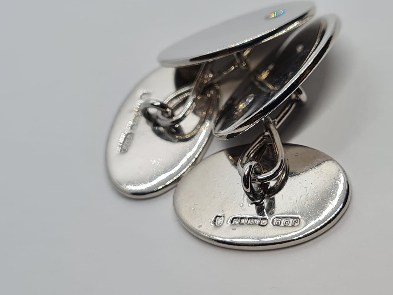 a pair of 18k white gold cuff links with a set diamond . 15.7gms - Image 3 of 9