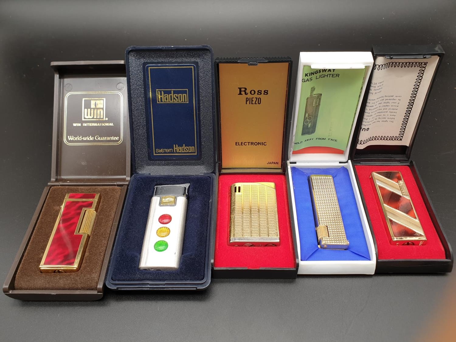 Five Vintage Lighters In Original Cases. A/F