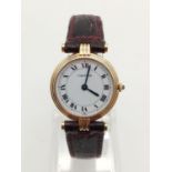 LADIES CARTIER QUARTZ WATCH ON ATTRACIVE BURGUNDY COLOURED STRAP. 25MM