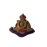 Vintage Royal artillery Association lapel badge in brass ,with contrasting red and blue enamel work.